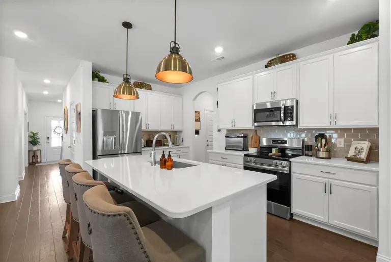 Kitchen with island and stainless appliances